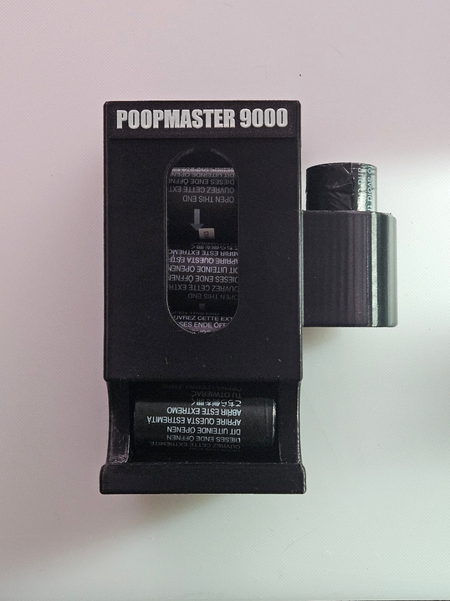 Black Doggy Poop Bah Holder labeled 'POOPMASTER 9000' on a light gray background